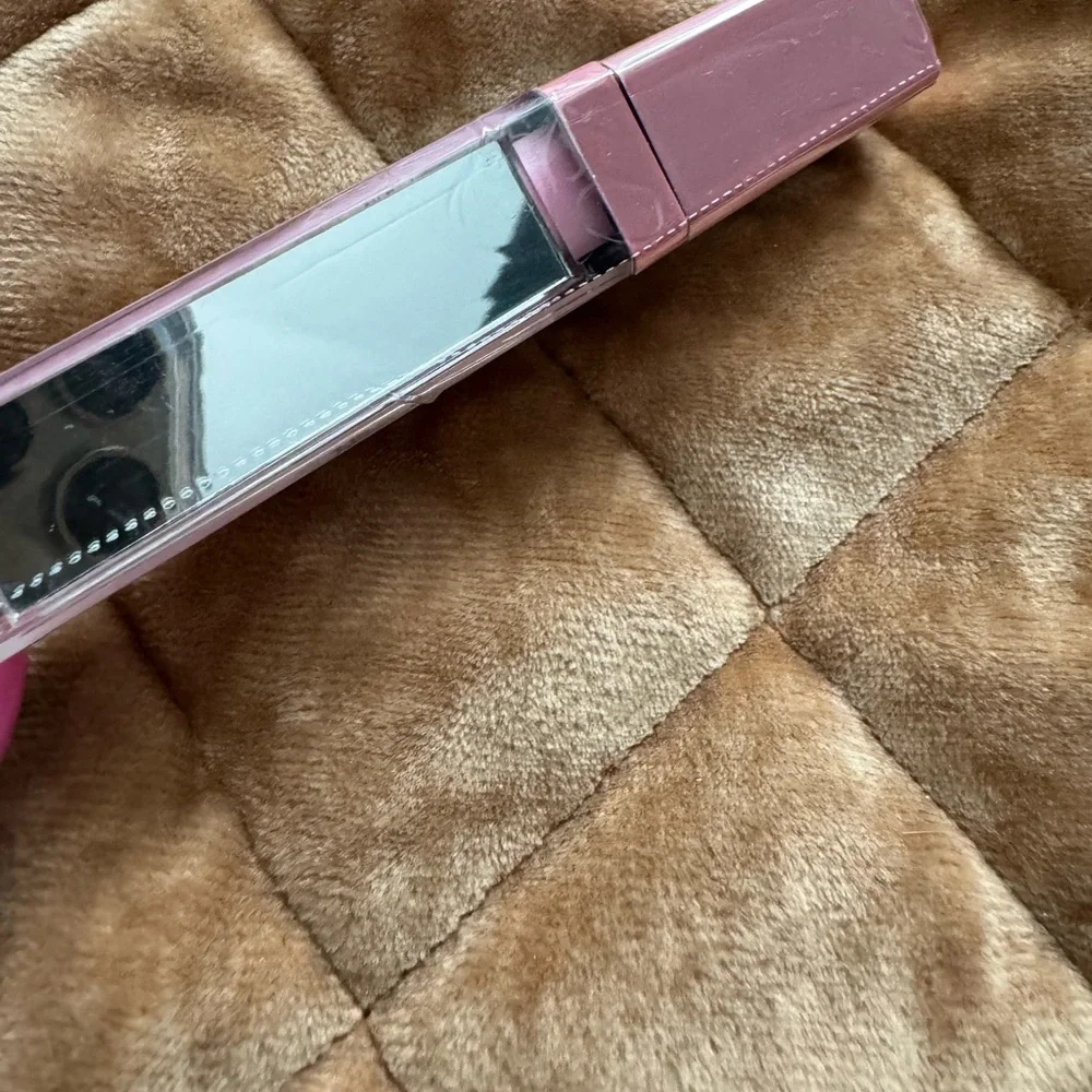 MCoBeauty lip gloss in “marshmallow.” Pretty pink shade with mirror on side 🩷